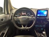 the interior of a car with a steering wheel, dashboard, and a touch screen