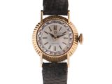 an image of a woman ' s wrist watch on a white background