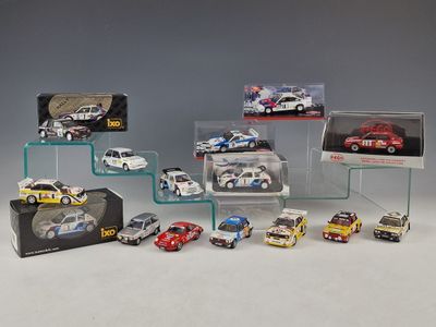 a lot of toy cars on display in a display case