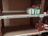 many shelves that have boxes on them in a store