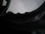 a close up view of a pair of black shoes