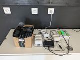a table with a bunch of electronics on top of it