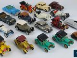 a lot of toy cars that are sitting on a table