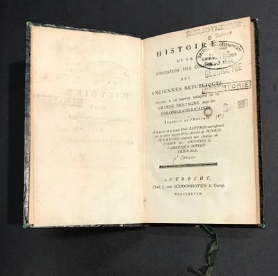 a book with writing on it sitting on a table