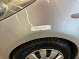 a close up of a car with a sticker on the front of it