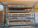 a garage with a lot of wood on the floor