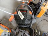 many chainsaws that are sitting on the ground