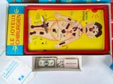 a box that has a game in it on a table