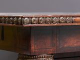 a wooden table with a marble top on a gray background