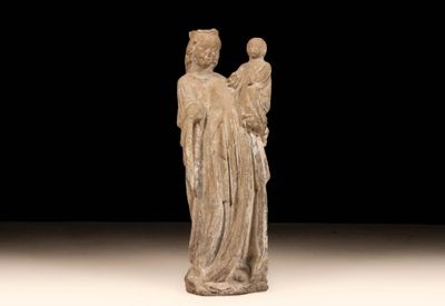 an image of a statue of a woman holding a child
