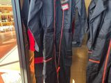 two jackets that are on display in a store