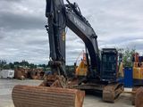 a bulldozer that is sitting in a parking lot