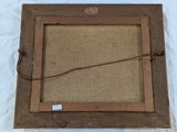 an old picture frame with a rope hanging from it ' s side