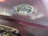 a close up of a motorcycle engine with a plaque on it