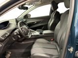 the interior of a car with the door open and the driver ' s seat down