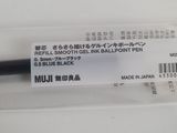 an image of a close up of a pen with a label on it