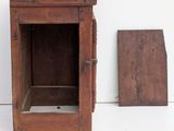 a small wooden box and a small wooden box on the floor