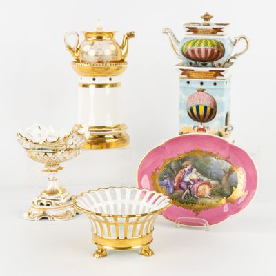 many different types of vases and bowls on the table
