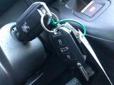 a car key that is attached to a car key holder