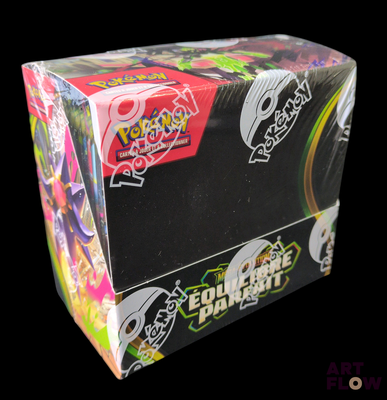 une boîte de cartes à collectionner Pokémon sur fond noir