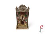 statue of the virgin mary and child jesus in a wooden frame
