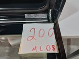 a sign on the glass door of an oven