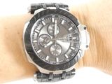 a close up of a watch on a person ' s wrist