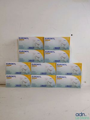 several boxes of euronyl are stacked on a shelf in the corner of a room