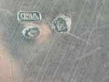 a close up of a piece of metal on a table