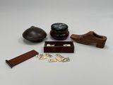 a wooden box with dice pieces and a wooden box with a wooden box with dice pieces and a wooden box with dice pieces and a wooden box with dice