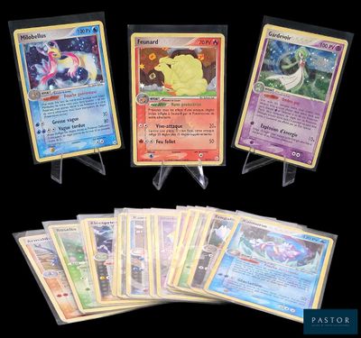 Plusieurs cartes Pokémon sont alignées les unes à côté des autres sur un fond noir.