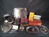 a lot of silver items on a black table