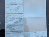 a picture of a driver ' s license on a car window