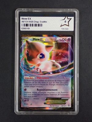 a close up of a pokemon card on a black surface