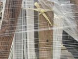 a pallet of wood that has been wrapped in plastic