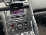 a car dashboard with a phone holder on it