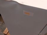 a white box sitting on top of a wooden pallet