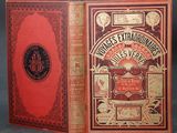 an old book with a red cover and gold lettering on it