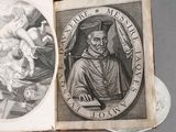an old book with a drawing of a man holding a baby