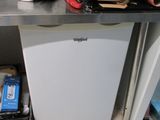 an image of a kitchen with a refrigerator and a dishwasher