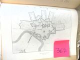 a picture of a map in a box with a pink post it