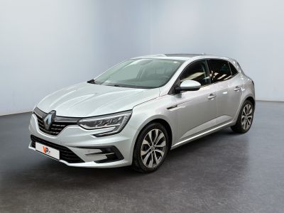a white car in a white room with a black floor