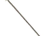 a close up of a bracelet with black and white beads