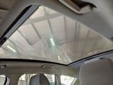 a view of the sunroof from inside of a car