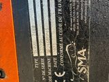 a close up of a parking meter with a sticker on it