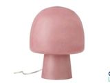 une lampe rose en forme de champignon sur fond blanc