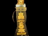 a gold clock with a statue on top of it