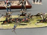 a lot of figurines that are on a table