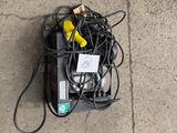 a bunch of wires that are laying on the ground