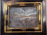 an old picture of a painting on a wall in a frame